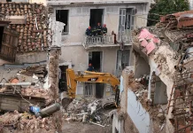 Two killed as blast levels building in Athens, authorities say Two dead after explosion destroys building in Athens