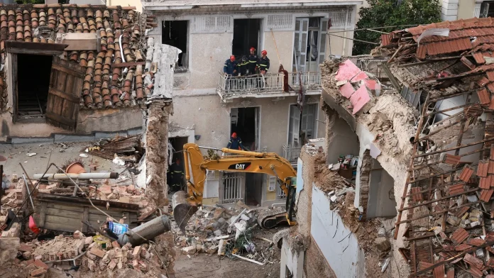 Two killed as blast levels building in Athens, authorities say Two dead after explosion destroys building in Athens