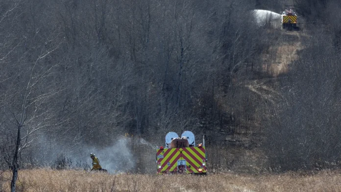 Four dead, 19 critical after winds turn grass fire deadly