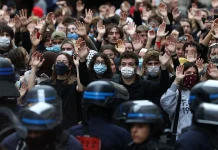 France Halts Stun Grenade Use After Student Injured in Incident France suspends stun grenades after student injury