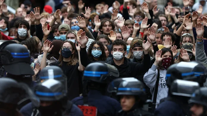 France Halts Stun Grenade Use After Student Injured in Incident France suspends stun grenades after student injury