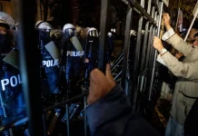 Poland Deploys Riot Police After Suspension of Top Court Chief Polish riot police deployed after court chief suspended